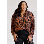 Show off your wild side in our Seriously Fierce Animal Print Blouse. Featuring burnout black velvet animal print