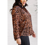Show off your wild side in our Seriously Fierce Animal Print Blouse. Featuring burnout black velvet animal print