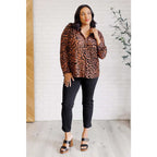 Show off your wild side in our Seriously Fierce Animal Print Blouse. Featuring burnout black velvet animal print
