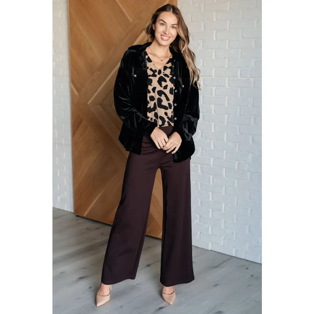 Our She’s Got Eyes of Gold Batwing Blouse is made from a soft woven material in playful animal print beige and black.