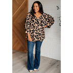 Our She’s Got Eyes of Gold Batwing Blouse is made from a soft woven material in playful animal print beige and black.