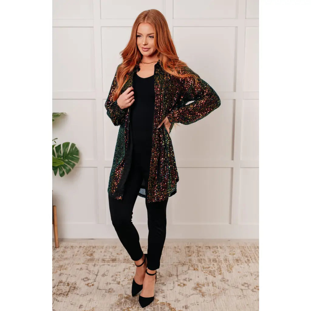 Our Shimmering Splendor Sequin Shirt Mini Dress is the perfect statement piece for any occasion. Featuring a collared
