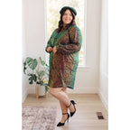 Our Shimmering Splendor Sequin Shirt Mini Dress is the perfect statement piece for any occasion. Featuring a collared