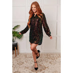 Our Shimmering Splendor Sequin Shirt Mini Dress is the perfect statement piece for any occasion. Featuring a collared