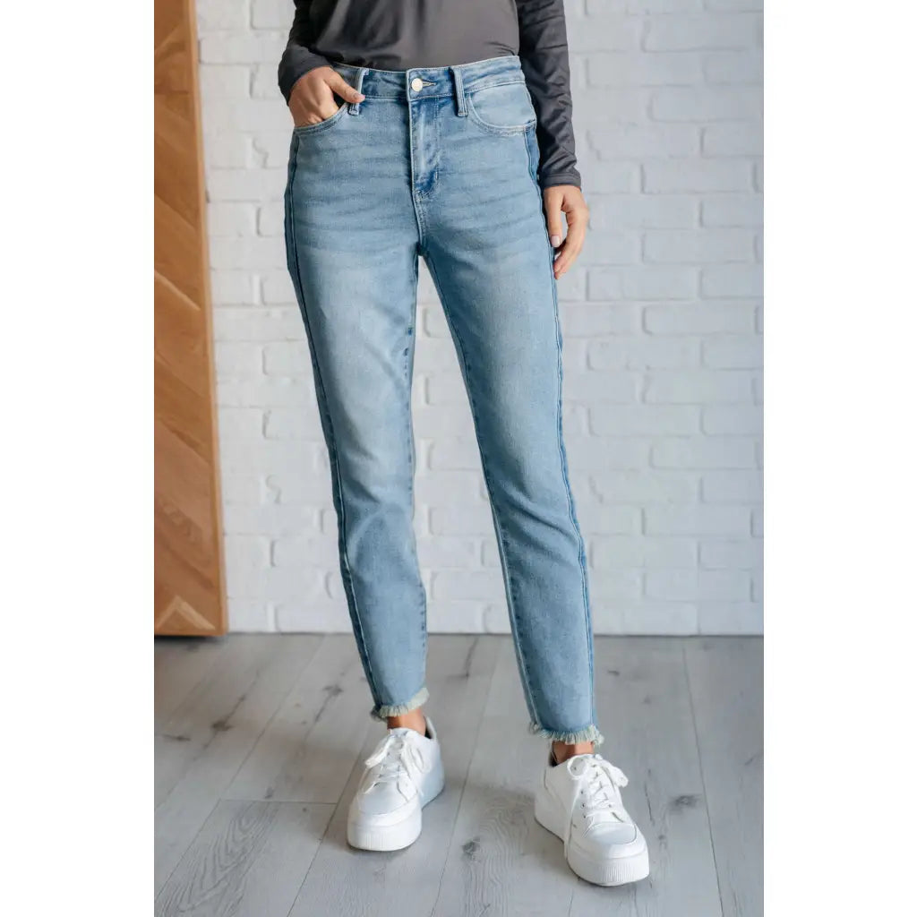 Get ready to elevate your denim game with our Side Panel High Rise Slim Judy Blue Jeans. Easily style for just about