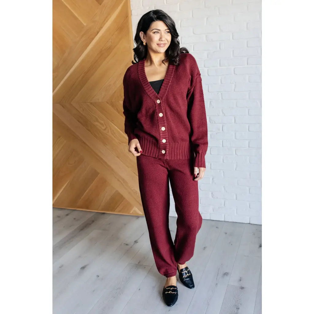 Our Simple Solution Textured Jogger Set in Wine boasts a knit v-neck sweater and high rise jogger pants. The features