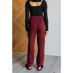 Our Simple Solution Textured Jogger Set in Wine boasts a knit v-neck sweater and high rise jogger pants. The features