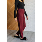 Our Simple Solution Textured Jogger Set in Wine boasts a knit v-neck sweater and high rise jogger pants. The features