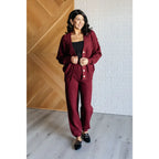 Our Simple Solution Textured Jogger Set in Wine boasts a knit v-neck sweater and high rise jogger pants. The features