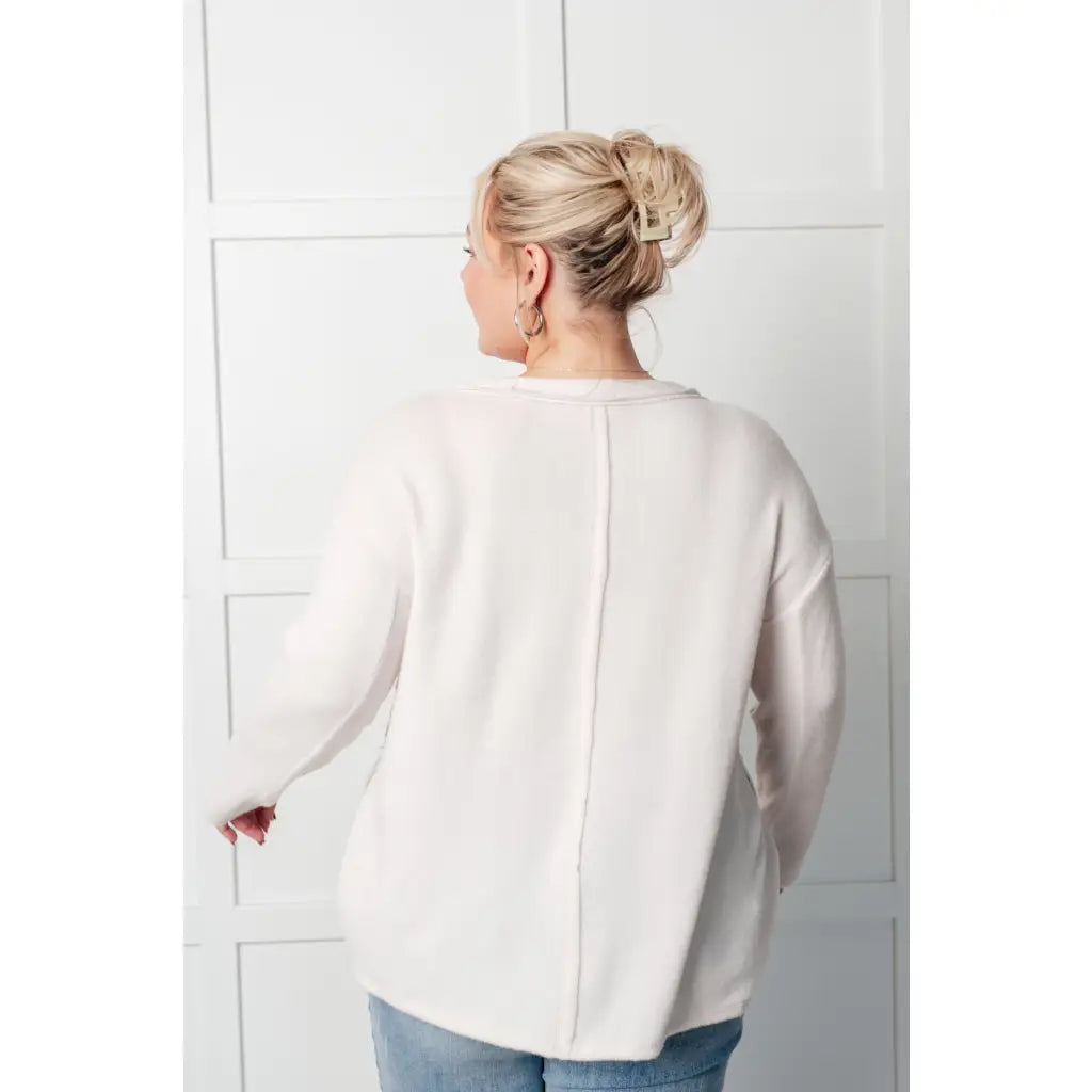 Take on the day in style and comfort with our Simply Soft Sweater Sand Beige. Made from luxurious stretchy brushed