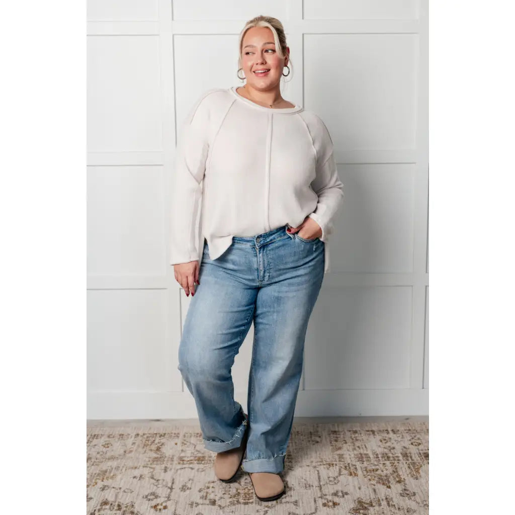 Take on the day in style and comfort with our Simply Soft Sweater Sand Beige. Made from luxurious stretchy brushed