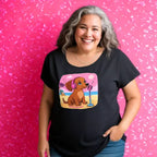 Flattering scoop-neck mini dachshund graphic dolman tee in sizes XS–3XL. Features original artwork by Sweet Roo Bou™