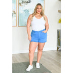 Mid rise Judy Blue shorts with raw hem and stretch. Flattering fit for standard curvy plus sizes. Spring summer denim