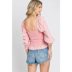 Chic and feminine blush pink smocked ruffled top with a chic square neckline. Available in standard plus sizes (SM-3XL).