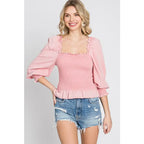Chic and feminine blush pink smocked ruffled top with a chic square neckline. Available in standard plus sizes (SM-3XL).