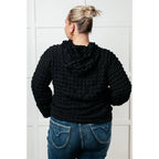 Stay cozy in our Speak Your Thoughts Bubble Hoodie Black. Made from bubble knit fabric this hoodie will keep you warm