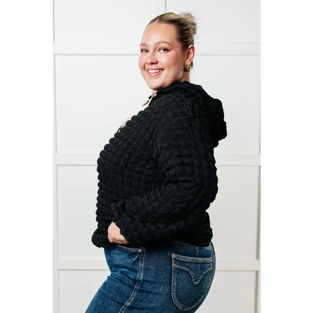 Stay cozy in our Speak Your Thoughts Bubble Hoodie Black. Made from bubble knit fabric this hoodie will keep you warm