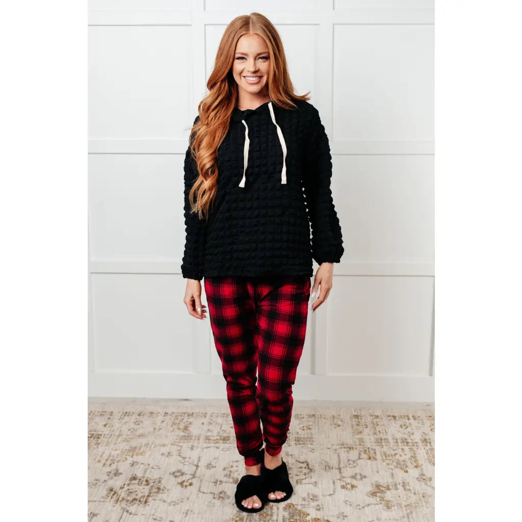 Stay cozy in our Speak Your Thoughts Bubble Hoodie Black. Made from bubble knit fabric this hoodie will keep you warm