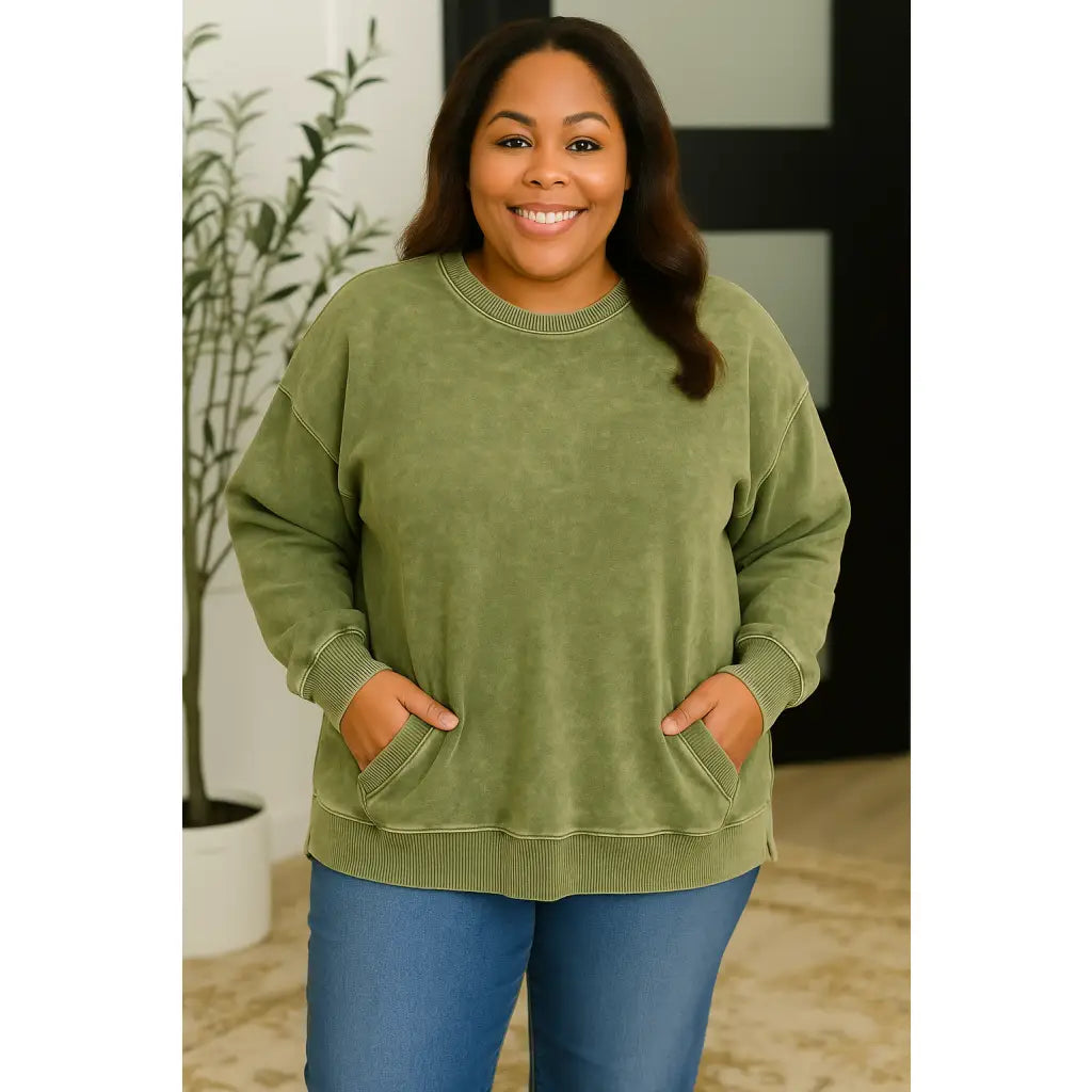 Wrap yourself in cozy vibes with our Stormy Pistachio Latte Pullover! Featuring stretchy fleece drop shoulders