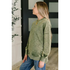 Wrap yourself in cozy vibes with our Stormy Pistachio Latte Pullover! Featuring stretchy fleece drop shoulders