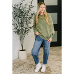 Wrap yourself in cozy vibes with our Stormy Pistachio Latte Pullover! Featuring stretchy fleece drop shoulders