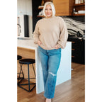 Stay stylish and cozy with our String Me Along Pearl Accent Beige Sweater. Made from lightweight knit this sweater