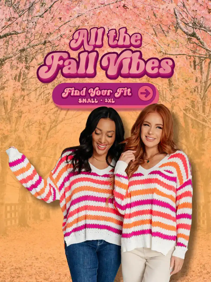 Striped fall sweater with orange, pink and white colors.