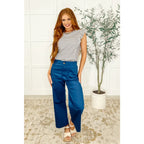 Vertical stripe ruffle sleeve top in soft white and charcoal. Stretchy rib knit boutique texture. SM to 3XL. Ships fast