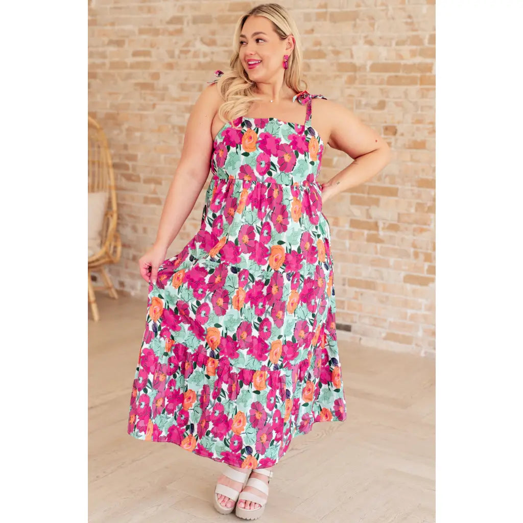 Get ready to love our Such a Lover Girl Tiered Dress! Made from cheerful floral woven fabric it features square