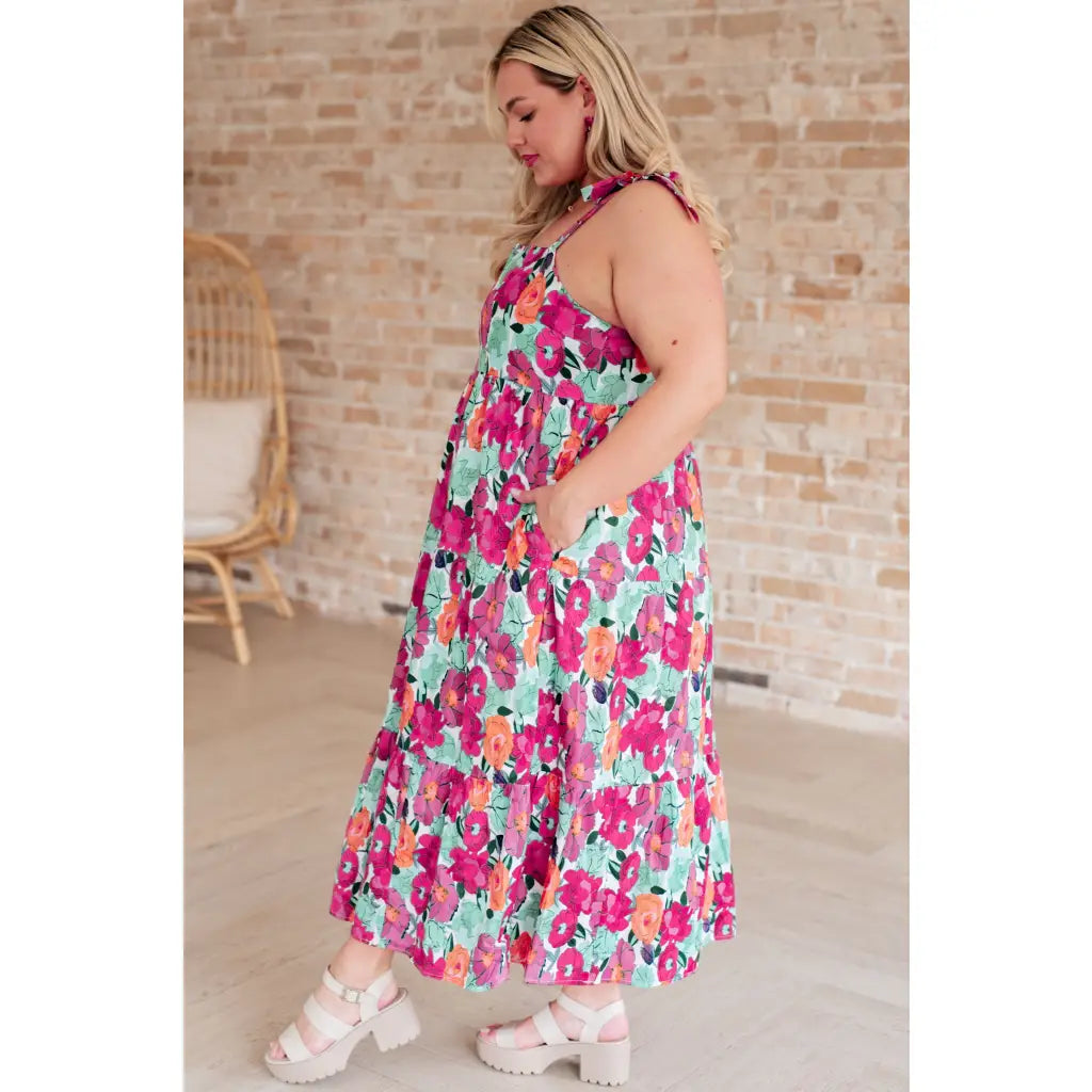 Get ready to love our Such a Lover Girl Tiered Dress! Made from cheerful floral woven fabric it features square