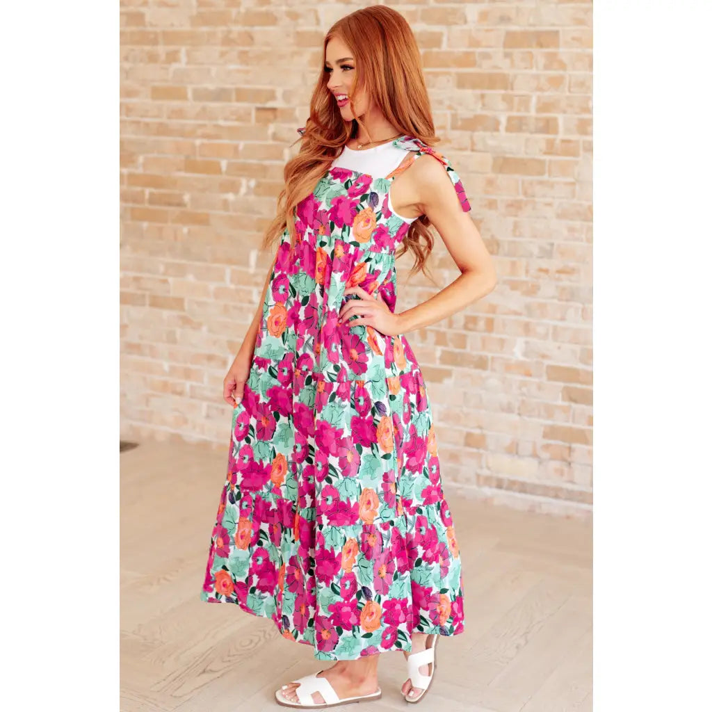 Get ready to love our Such a Lover Girl Tiered Dress! Made from cheerful floral woven fabric it features square
