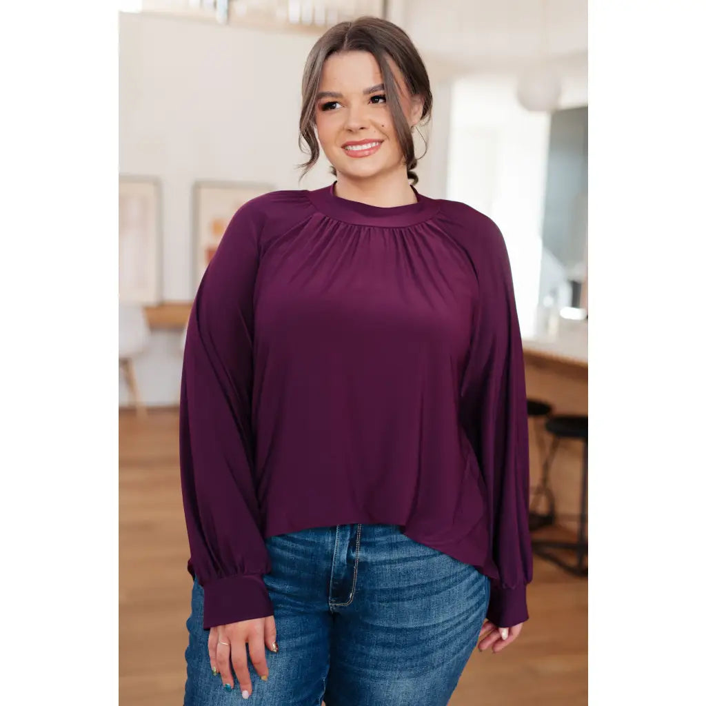 Our Sugar Plum Mock Neck Blouse is the perfect addition to your wardrobe. The stretchy and wrinkle resistant bulgari