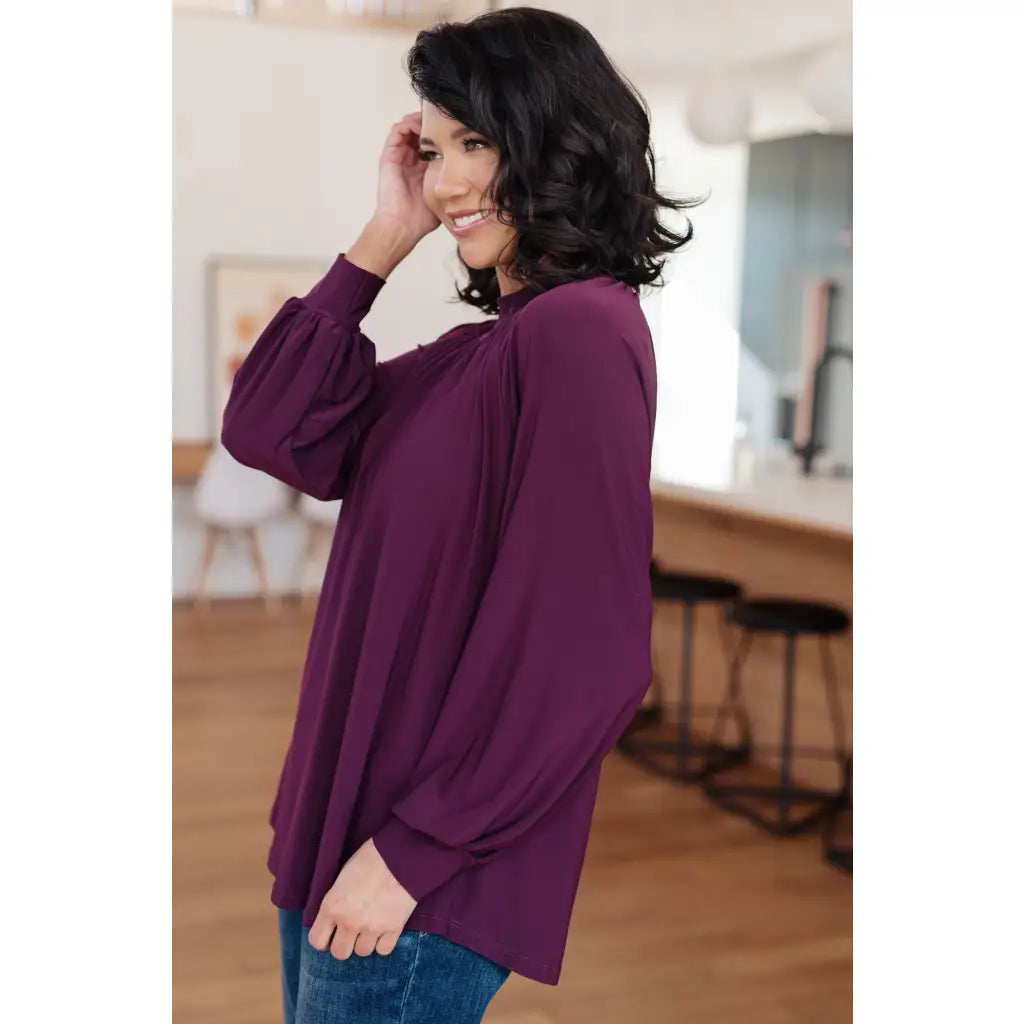 Our Sugar Plum Mock Neck Blouse is the perfect addition to your wardrobe. The stretchy and wrinkle resistant bulgari