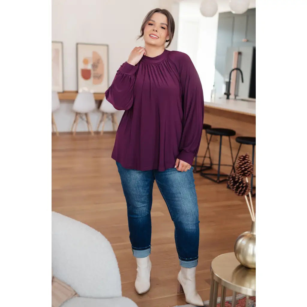 Our Sugar Plum Mock Neck Blouse is the perfect addition to your wardrobe. The stretchy and wrinkle resistant bulgari