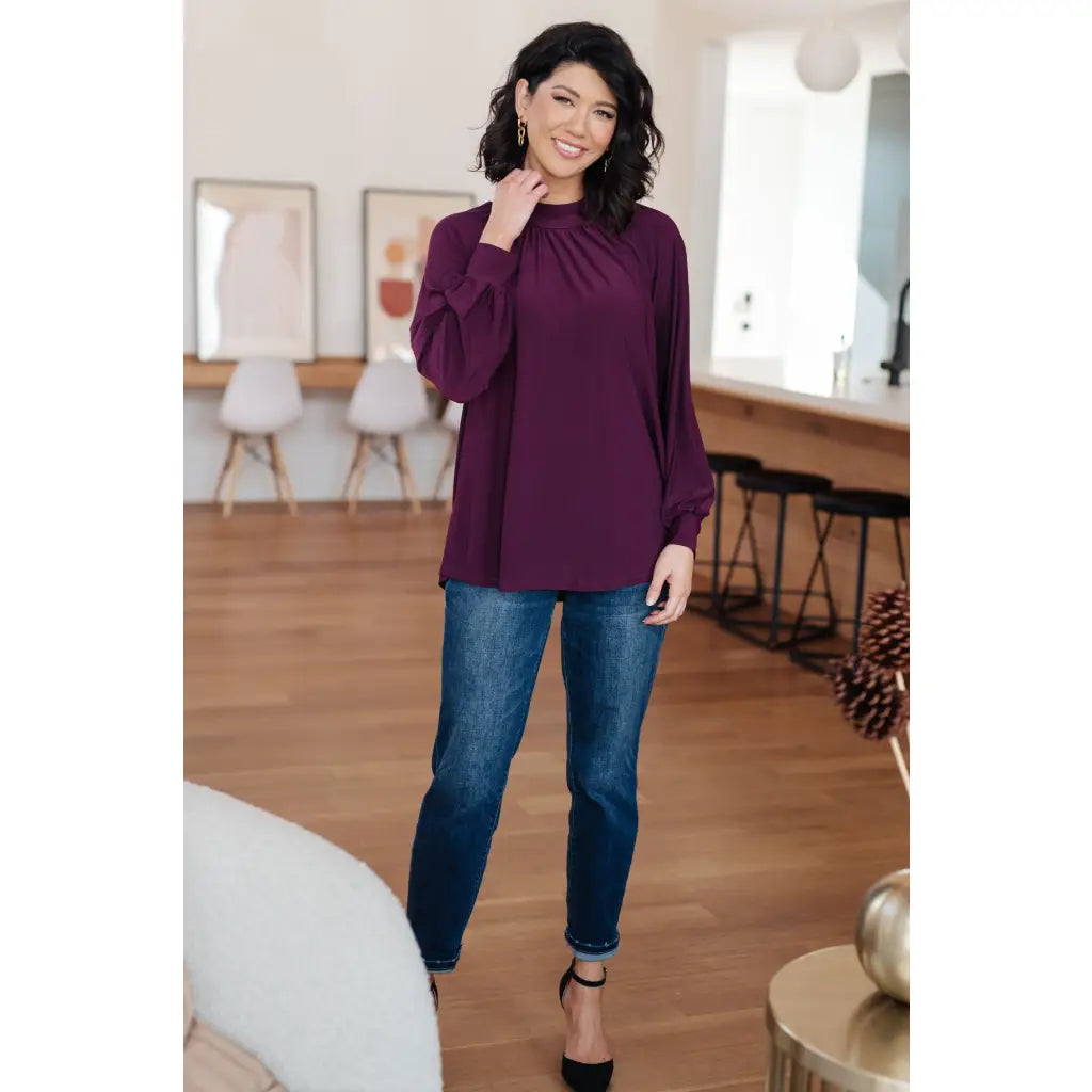 Our Sugar Plum Mock Neck Blouse is the perfect addition to your wardrobe. The stretchy and wrinkle resistant bulgari