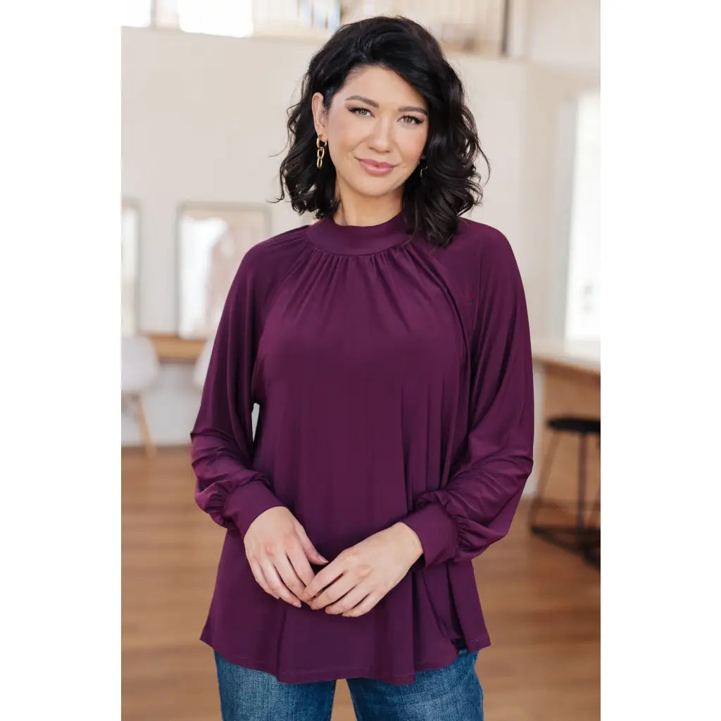 Our Sugar Plum Mock Neck Blouse is the perfect addition to your wardrobe. The stretchy and wrinkle resistant bulgari