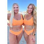 Textured cheeky bikini bottoms in bold citrus orange. Fully lined plus sizes available. Sold separately. Ships fast.