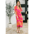 Brighten your day in the Sunshine Serenade Midi Dress a vibrant pink plus size friendly dress with pockets flutter