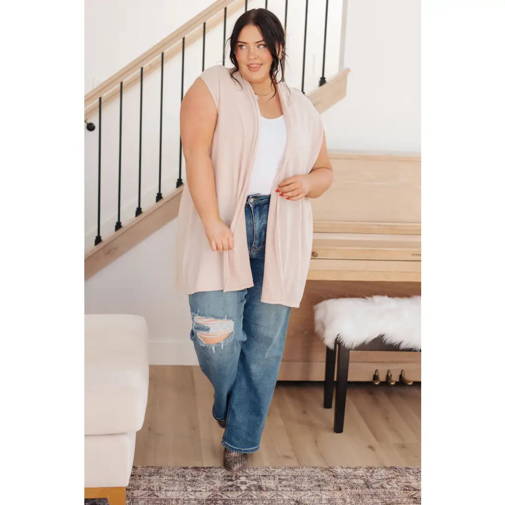 Layer your look with our Surely a Win Sleeveless Cardigan. Crafted from gorgeous beige lightweight sweater knit shawl