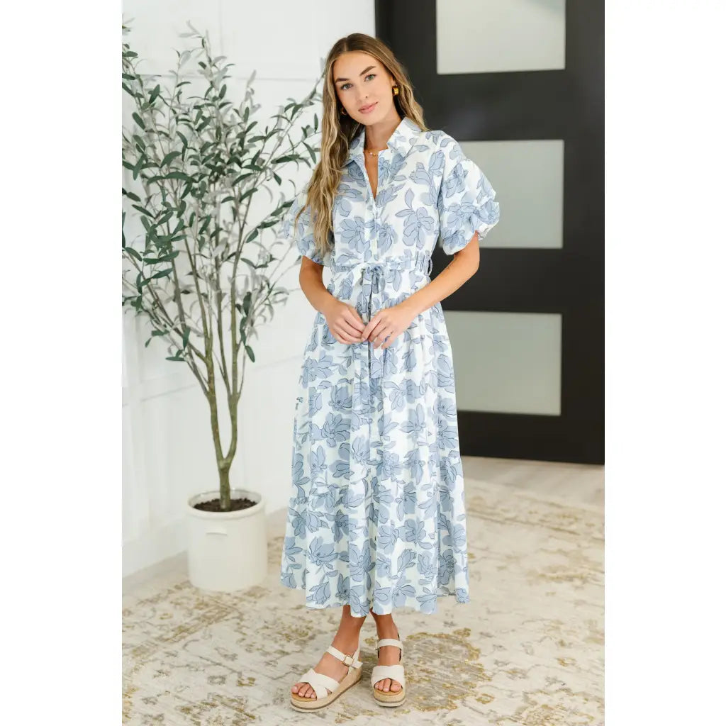 Southern-inspired plus size floral shirt dress in a belted button-down maxi style. A boho balloon sleeve look perfect