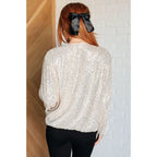 Shimmer in the Sweet Roo Sparkle Sequin Jacket with our plus size friendly glam. Full zip balloon sleeves fully lined