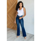 Our Sweet Side Seams Flare Judy Blue Jean are high rise non-distressed jeans feature a dark wash and unique offset side