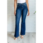 Our Sweet Side Seams Flare Judy Blue Jean are high rise non-distressed jeans feature a dark wash and unique offset side