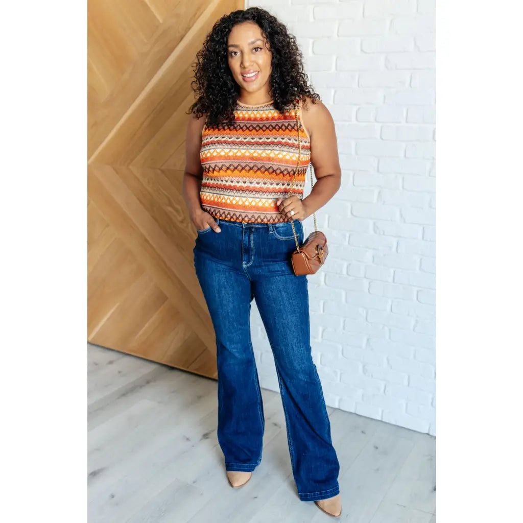 Our Sweet Side Seams Flare Judy Blue Jean are high rise non-distressed jeans feature a dark wash and unique offset side