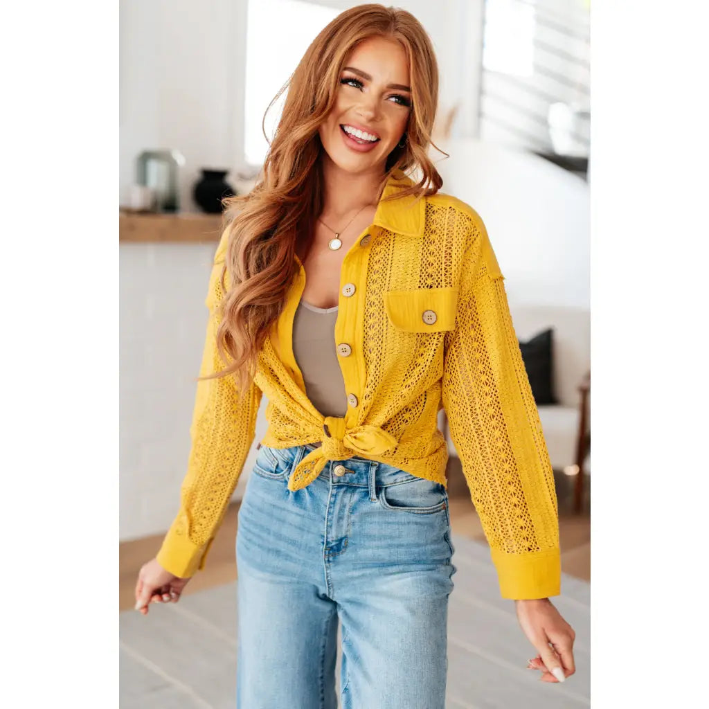 Our Sweeter Than Nectar Lace Button Down Blouse in Honey is crafted with delicate crocheted lace and a wood button