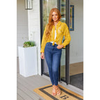 Our Sweeter Than Nectar Lace Button Down Blouse in Honey is crafted with delicate crocheted lace and a wood button