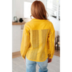 Our Sweeter Than Nectar Lace Button Down Blouse in Honey is crafted with delicate crocheted lace and a wood button