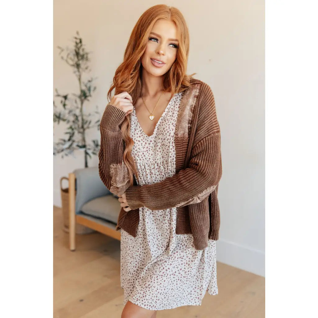 Vintage-inspired plus size friendly cardigan in a vintage brown with cozy knit elbow patches and front pockets. Perfect