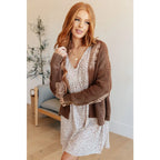 Vintage-inspired plus size friendly cardigan in a vintage brown with cozy knit elbow patches and front pockets. Perfect