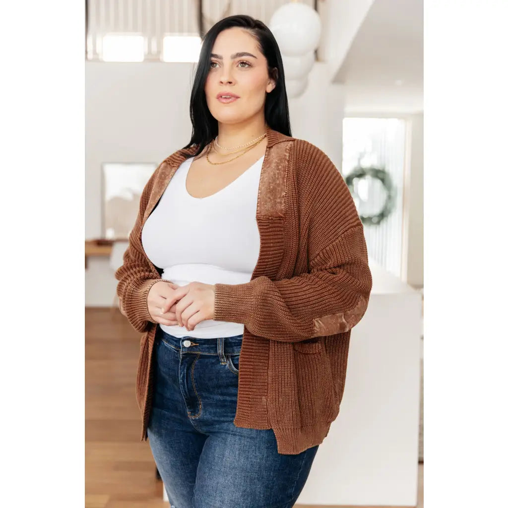 Vintage-inspired plus size friendly cardigan in a vintage brown with cozy knit elbow patches and front pockets. Perfect